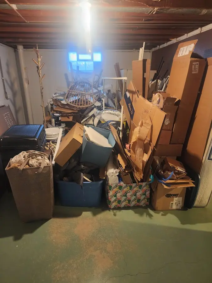 Roll-off dumpster container at job site for 4 Yard Dumpster Rental in Portland